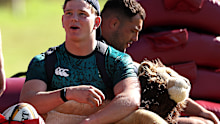 PERTH, AUSTRALIA - JUNE 25:  Henry Pollock holds onto the British & Irish Lions mascot BIL during the British & Irish Lions training session held at Hale School on June 25, 2025 in Perth, Australia. (Photo by David Rogers/Getty Images)
