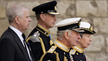 Prince Andrew, Duke of York, Prince Edward, Earl of Wessex, King Charles III and Anne, Princess Royal walk behind the Queen's funeral cortege on September 19, 2022 in London.
