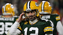 Aaron Rodgers #12 of the Green Bay Packers reacts after failing to get a first down during the 2nd quarter of the NFC divisional playoff game against the San Francisco 49ers.