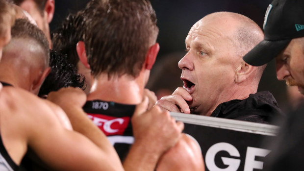 Port coach Ken Hinkley, addresses his players during their match against Western Bulldogs.