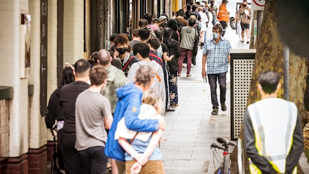 Long queues of people waiting at the Covid-19 testing site in Russell Street, Melbourne. 