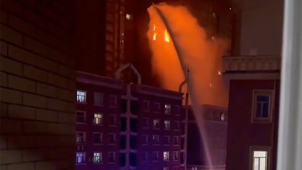 A fire in an apartment building in northwestern China's Xinjiang region killed 10 people and injured nine, amid stringent lockdowns that have left many residents in the area stuck in their homes for more than three months.