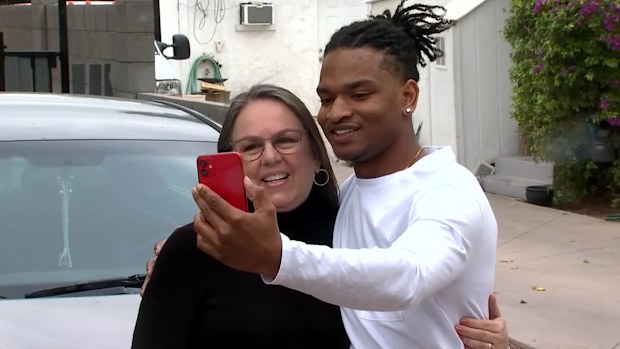 Young man who was accidentally invited to 'grandma's' Thanksgiving as a teen celebrates 6th year of dinner together.