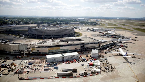 The passenger has been detained at Charles de Gaulle Airport for several days.