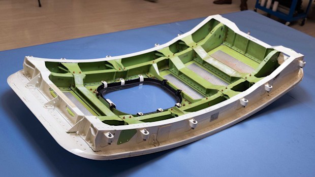 The door plug from the Alaska Airlines Flight 1282's Boeing 737-9 MAX airplane is shown at the National Transportation Safety Board laboratory, in Washington, on July 30.