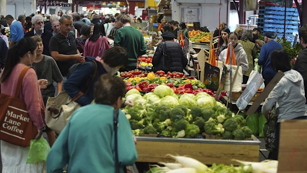 General photo of people shopping for fruits and vegetables at the Queen Vic Market on Friday 2, December 2023. inflation consumer economy