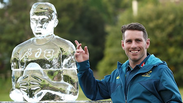 Bernard Foley with an 'Iceman' sculpture made in his honour.