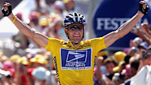 Lance Armstrong celebrates as he wins stage 17 of the Tour de France in 2004.