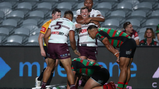 Jake Toby of the Sea Eagles celebrates scoring a try during the South Sydney Rabbitohs and the Manly Sea Eagles at Industree Group Stadium on February 10, 2023 in Gosford, Australia. (Photo by Jason McCawley/Getty Images)