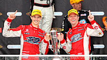 Nick Percat (left) and Garth Tander celebrate their 2011 Bathurst 1000 triumph.