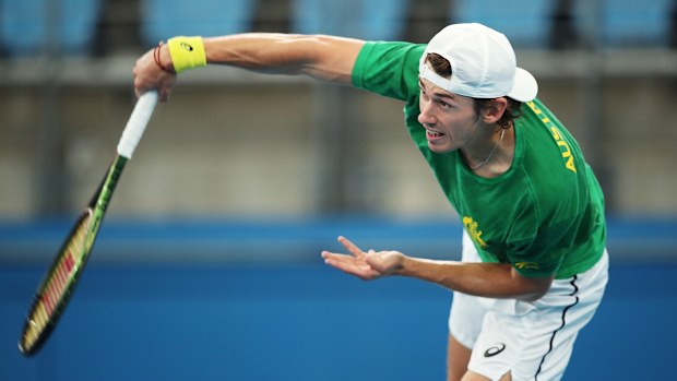 Alex de Minaur serves during a practice session ahead of the Davis Cup Qualifier.