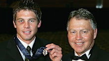 Ben Cousins poses with his father Bryan Cousins after winning the 2005 Brownlow Medal.