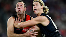 Todd Goldstein of the Bombers and Tom De Koning of the Blues compete in the ruck.