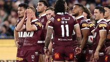 Daly Cherry-Evans and the Maroons react after another Blues try. 