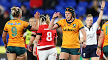 Layne Morgan and Emily Chancellor of Australia celebrate.