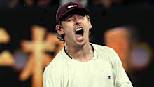 MELBOURNE, AUSTRALIA - JANUARY 23: Alex de Minaur of Australia celebrates winning match point against Frances Tiafoe of the United States during the Men's Singles Third Round match on day six of the 2026 Australian Open at Melbourne Park on January 23, 2026 in Melbourne, Australia. (Photo by Cameron Spencer/Getty Images)