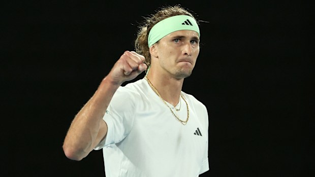 Alexander Zverev of Germany celebrates winning set point in his round three singles match against Alex Michelsen of the United States.