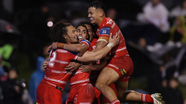 Tyrell Sloan of the Dragons celebrates scoring a try during the round 13 NRL match between Penrith Panthers and St George Illawarra Dragons at BlueBet Stadium on June 01, 2024 in Penrith, Australia. (Photo by Jason McCawley/Getty Images)