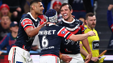 Billy Smith of the Roosters celebrates scoring a try.