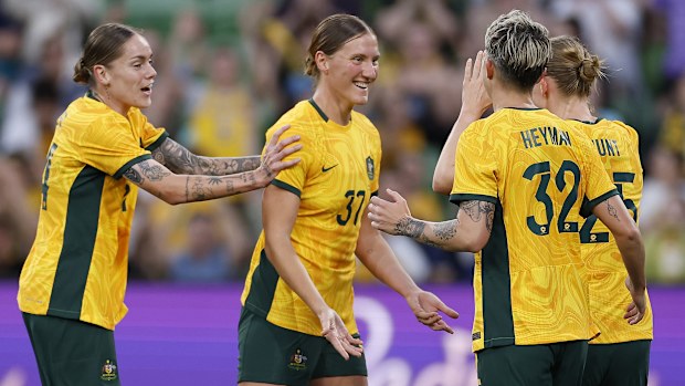 Natasha Prior celebrates with teammates after scoring the opening goal during the international friendly between the Matildas and Chinese Taipei.