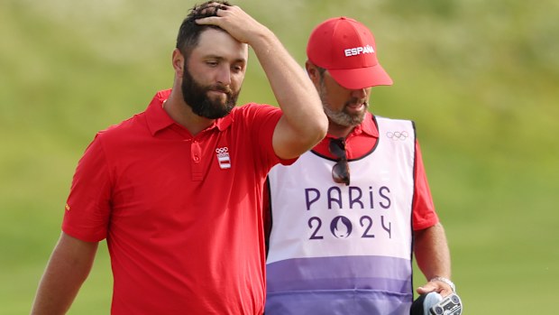 Jon Rahm of Team Spain reacts to blowing a four-shot lead.