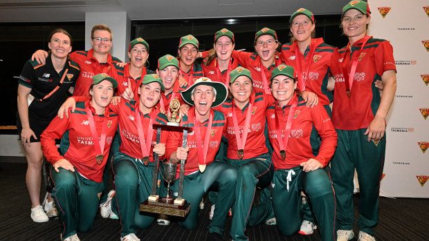 Tasmanian Tigers players celebrate the win with the trophy during the WNCL Final match between Tasmania and South Australia at Blundstone Arena, on February 25, 2023, in Hobart, Australia. (Photo by Steve Bell/Getty Images)