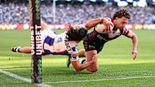 Mark Nawaqanitawase scores for the Roosters.