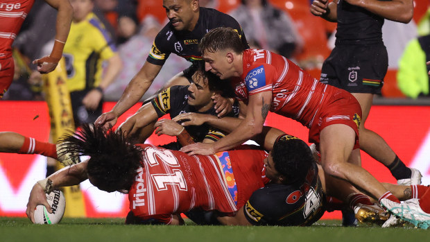 Raymond Faitala-Mariner of the Dragons scores a try during the round 13 NRL match between Penrith Panthers and St George Illawarra Dragons at BlueBet Stadium on June 01, 2024 in Penrith, Australia. (Photo by Jason McCawley/Getty Images)