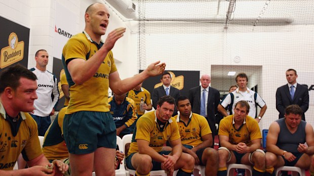 Wallabies captain Stirling Mortlock talks to his team at the Melbourne Cricket Ground.