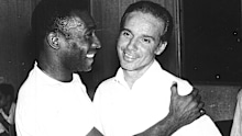 Brazil's soccer star Pele, left, embraces Mario Zagallo after the latter's appointment as coach of Brazil.