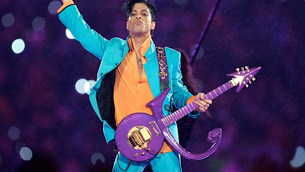Prince performs during the halftime show at the Super Bowl XLI football game in Miami on Feb. 4, 2007.
