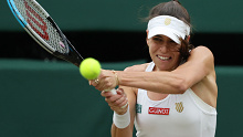 Australia's Ajla Tomljanovic plays a backhand in her ladies' singles quarter final match at Wimbledon.