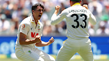ADELAIDE, AUSTRALIA - DECEMBER 18: Pat Cummins of Australia celebrates taking the wicket of Joe Root of England for 19 runs during day two of the Third Test Match in the 2025-26 Ashes Series between Australia and England at Adelaide Oval on December 18, 2025 in Adelaide, Australia. (Photo by Robert Cianflone/Getty Images)