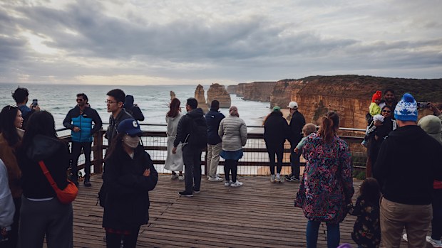 Visitors at Victoria's scenic coastline at Port Campbell. The popular tourist spot is slowly eroding over the years where visitors come to see the 12 Apostles.