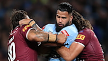 Payne Haas crashes into a Maroons defensive wall in the State of Origin opener.