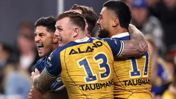 Dylan Brown of the Eels celebrates scoring a try with team mates during the round 12 NRL match between South Sydney Rabbitohs and Parramatta Eels at Allianz Stadium on May 19, 2023 in Sydney, Australia. (Photo by Cameron Spencer/Getty Images)