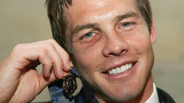Ben Cousins poses with the 2005 Brownlow Medal after being announced as the winner during the West Coast Eagles Brownlow Medal Dinner at the Burswood Casino.