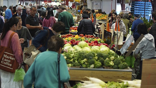 General photo of people shopping for fruits and vegetables at the Queen Vic Market on Friday 2, December 2023. inflation consumer economy