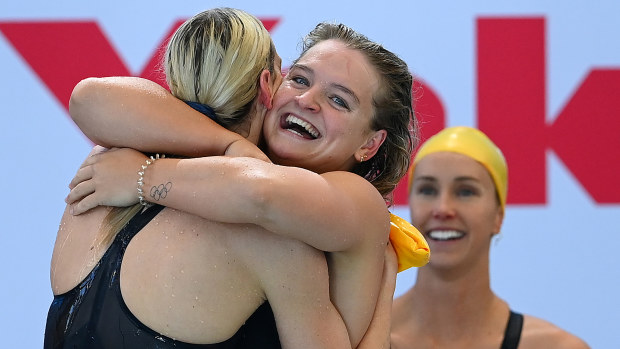 Chelsea Hodges and Madison Wilson embrace after setting a new short course world record in the 4x50m medley relay.