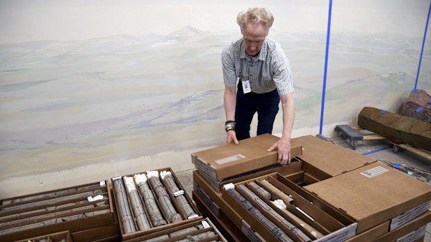 Geologist James Hagadorn closes boxes of core rock samples at the Denver Museum of Nature & Science on July 9, 2025. (AP Photo/Thomas Peipert)