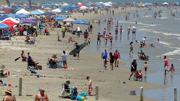 People gather on the beach for the Memorial Day weekend in Port Aransas, Texas.