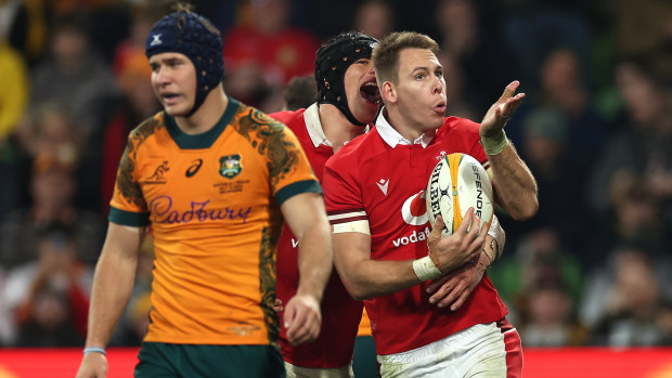 Liam Williams of Wales celebrates by blowing a kiss.