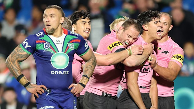 Blaize Talagi of the Panthers celebrates with team mates after scoring a try during the round 16 NRL match between the New Zealand Warriors and Penrith Panthers at Go Media Stadium on June 21, 2025, in Auckland, New Zealand. (Photo by Phil Walter/Getty Images)