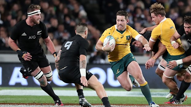 Bernard Foley of Australia looks for a gap at Eden Park.