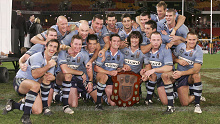 BRISBANE, QSL - JULY 6:The Blues celebrate winning game three of the ARL State of Origin series between the Queensland Maroons and the New South Wales Blues at Suncorp Stadium July 6, 2005 in Brisbane, Australia. (Photo by Cameron Spencer/Getty Images)