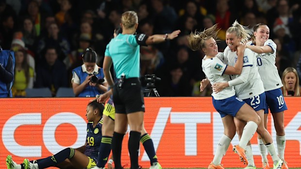 Alessia Russo of England celebrates with teammates after scoring her team's second goal of the quarter final.