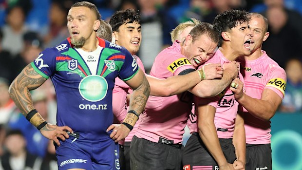 Blaize Talagi of the Panthers celebrates with team mates after scoring a try during the round 16 NRL match between the New Zealand Warriors and Penrith Panthers at Go Media Stadium on June 21, 2025, in Auckland, New Zealand. (Photo by Phil Walter/Getty Images)