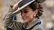 Catherine, Princess of Wales holds on to her hat as she leaves after Dame Sarah Mullally was installed as the first ever female leader of the Church of England at Canterbury Cathedral on March 25, 2026 in Canterbury, England. 