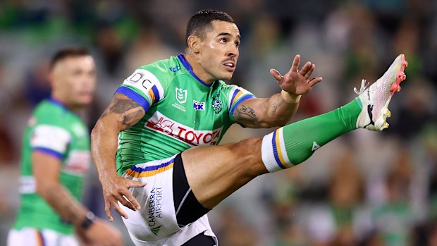 Jamal Fogarty kicks during the match-winning field goal between the Canberra Raiders and the Gold Coast Titans.