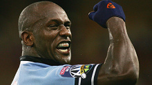 Wendell Sailor of the Waratahs celebrates victory against the Reds in 2006.